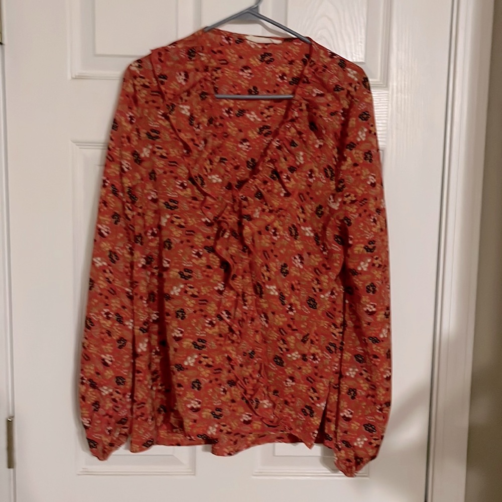 Women’s blouse with ruffle detail. Size large